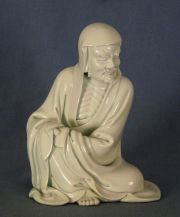 Figura de Blanc de Chine de anciano sentado