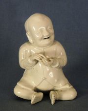 Figura de Blanc de Chine de nio o bebe sentado