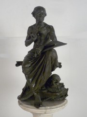 DROUOT, E. La Leccin, escultura fda. E. Drouot, pedestal de mrmol jaspeado, con desgastes.