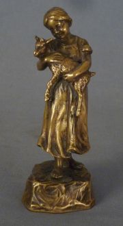 Oberg 'Nia con cabrito', escultura de bronce.