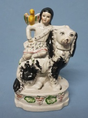 Perro con nia, figura de porcelana (Staffordshire)