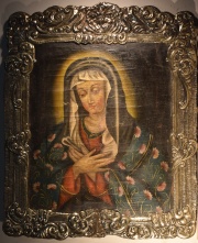 Virgen, leo Cuzqueo, marco repujado y cincelado.