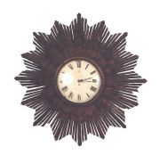 Reloj en forma de sol, madera.