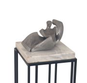 BADII, Libero. El Deseo Escultura de aluminio firmada Libero Badii, 1954, base de hierro y mármol blanco, c/ grabado
