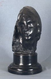 Erzia, Cabeza de Mujer, escultura de bronce. Firmado S.Erzia.