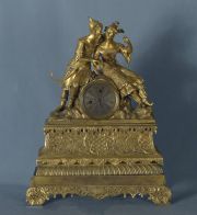 Reloj de mesa bronce con figuras. Sin pendulo y llave.