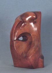 GAIMARI, Enrique. Figura, escultura de madera. Firmada, 62. 31, 5 cm.