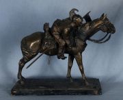 Dragon a caballo escultura de bronce