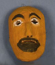 Mascara Chane, Rostro masculino, de palo borracho, h: 23 cm. Hacia 1930/40