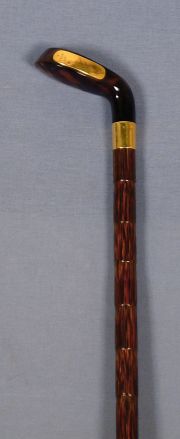 Bastn mango tipo Putter, con aplicaciones plata inglesa.