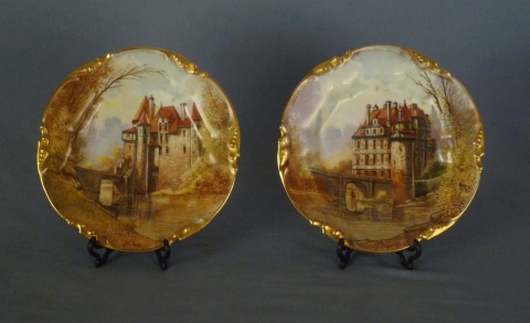 Dos platos de porcelana Limoges 'Castillos de Francia'