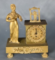 Reloj de mesa de bronce con figura femenina y putino. Paris. (140)