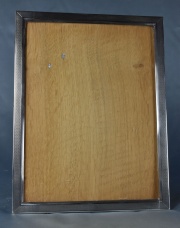 Portarretrato de madera con virola de plata. (541)