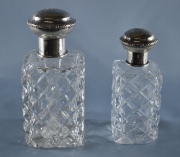 DOS PERFUMEROS, de cristal tallado con tapas de plata alemana 925. Alto: 13, 5 y 11, 5 cm.