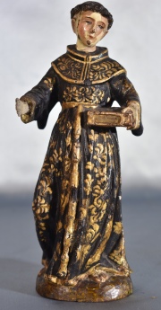 SAN ANTONIO, figura de madera tallada y policromada. Deterioros. Alto: 21,5 cm.