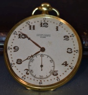 Reloj de bolsillo Ulisse Nardin, caja de oro. Faltantes, abolladura. Diámetro: 4.5 cm.