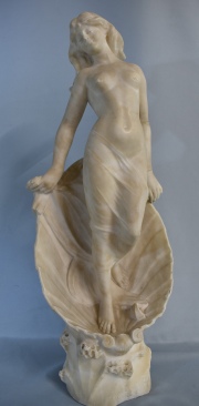 E. Battaglia. Venus sobre conchilla, figura de marmolina. Alto: 63 cm. restauraciónes y faltantes en brazo izquierdo.