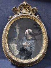 Santo Domingo y Virgen, relieve enmarcado. Alto: 53 cm.