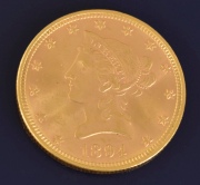 Moneda Norteamericana de oro de 10 dólares. Año 1894. Diámetro: 1,7 cm. Peso: 16,74 gr.